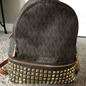 Brown and gold Michael Kors backpack